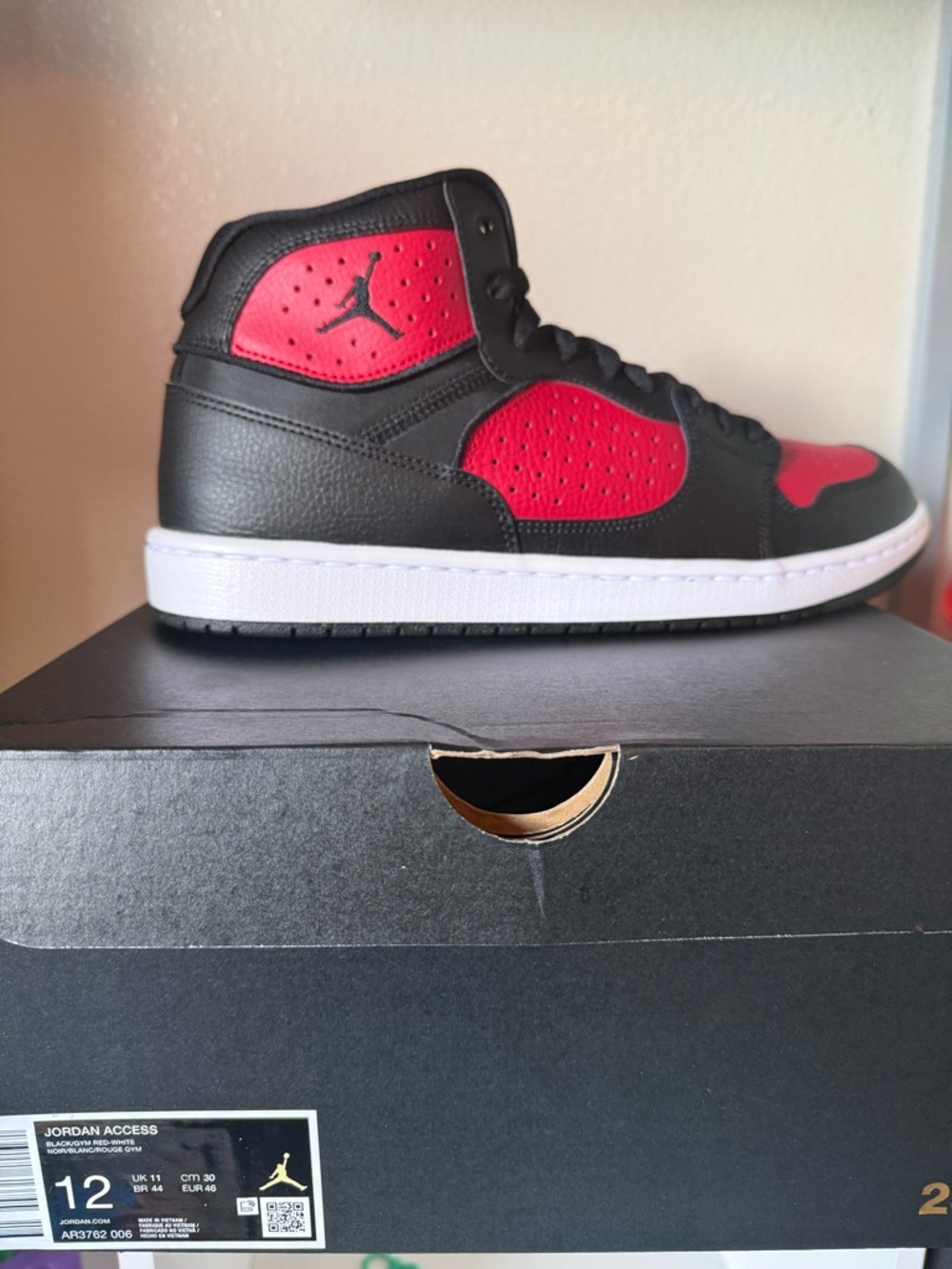 Jordan Black and Red Mid-Top Sneakers